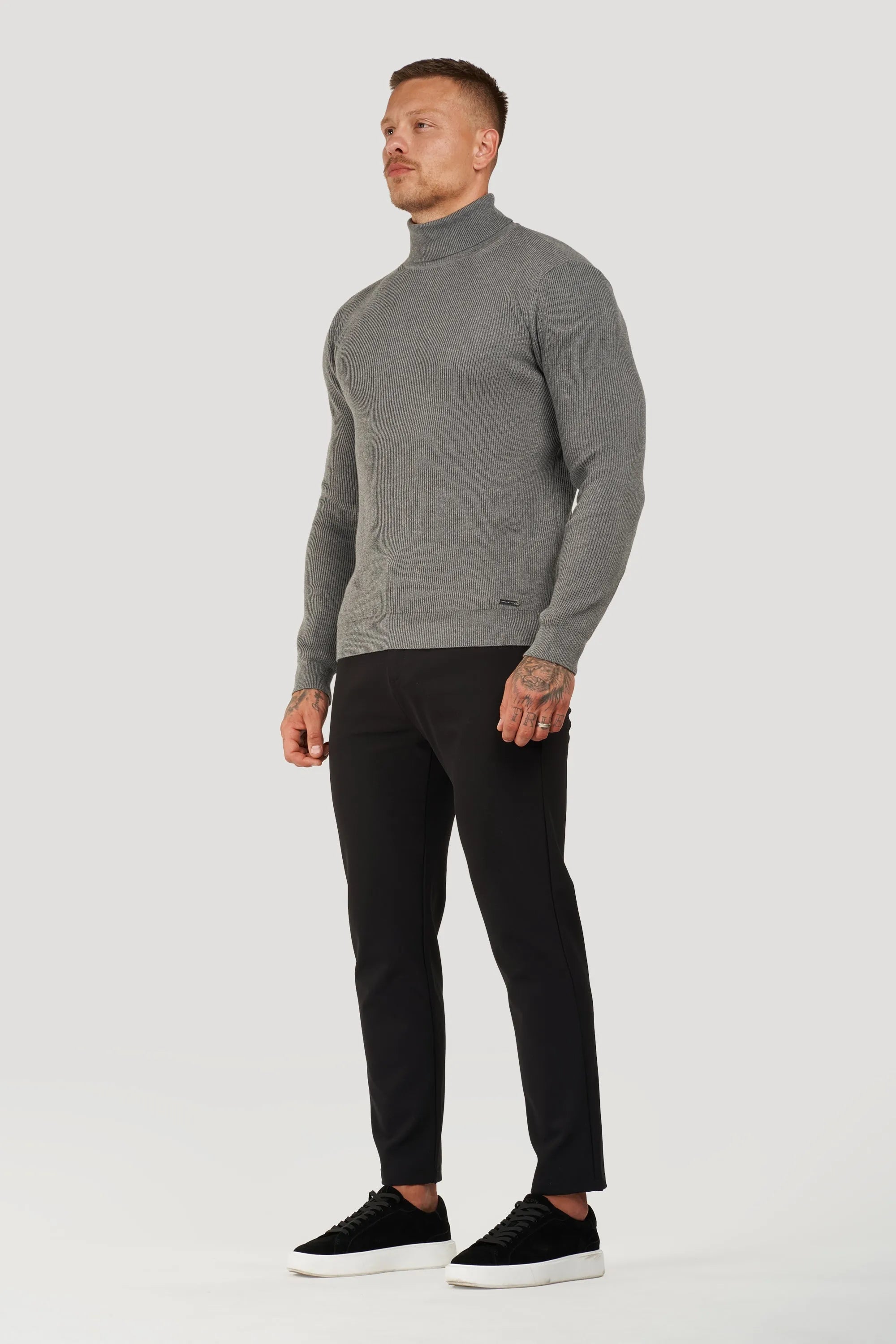 THE RENZO TURTLE NECK SWEATER - ICON. AMSTERDAM