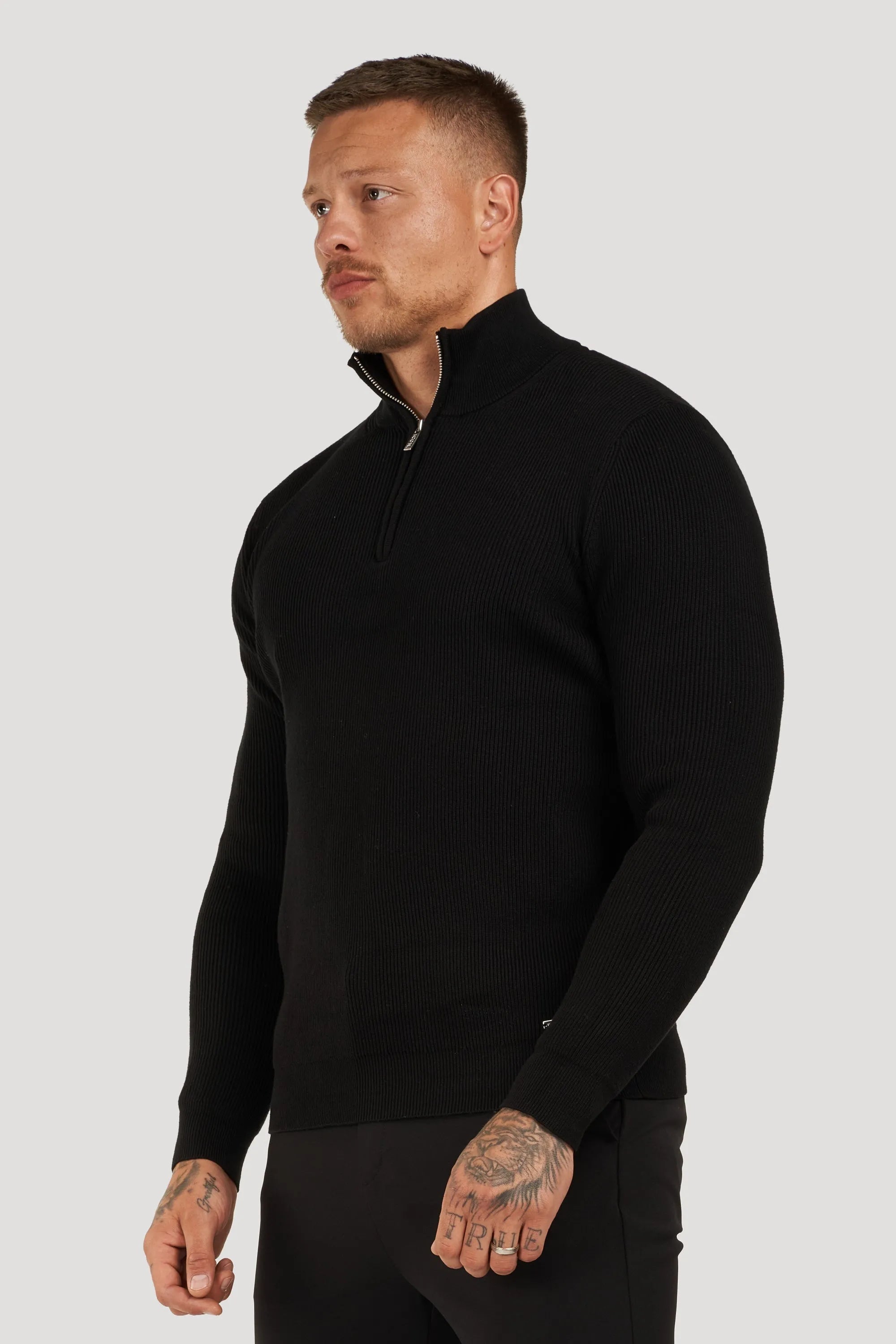 THE RENZO HALF ZIP SWEATER - ICON. AMSTERDAM