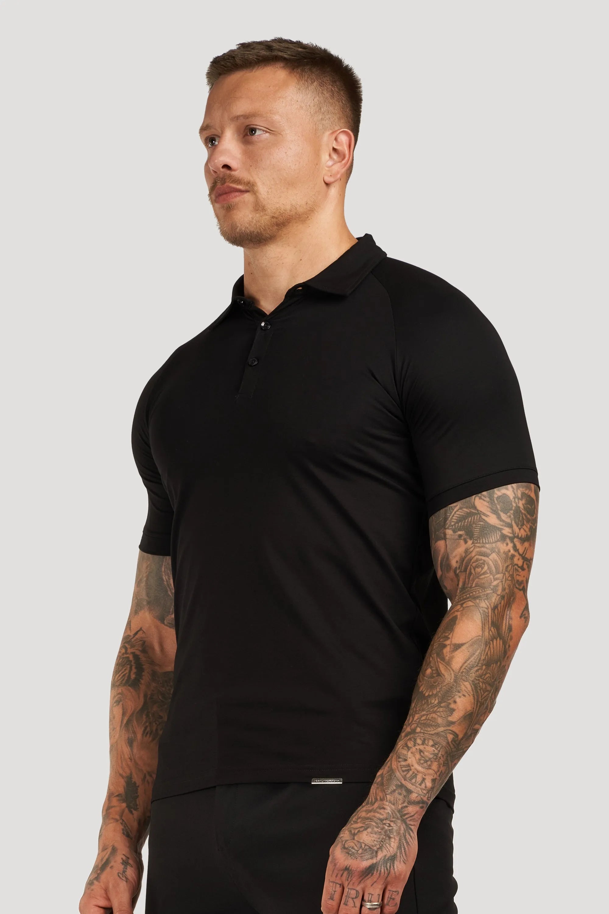 THE MUSCLE BUTTON POLO - BLACK - ICON. AMSTERDAM